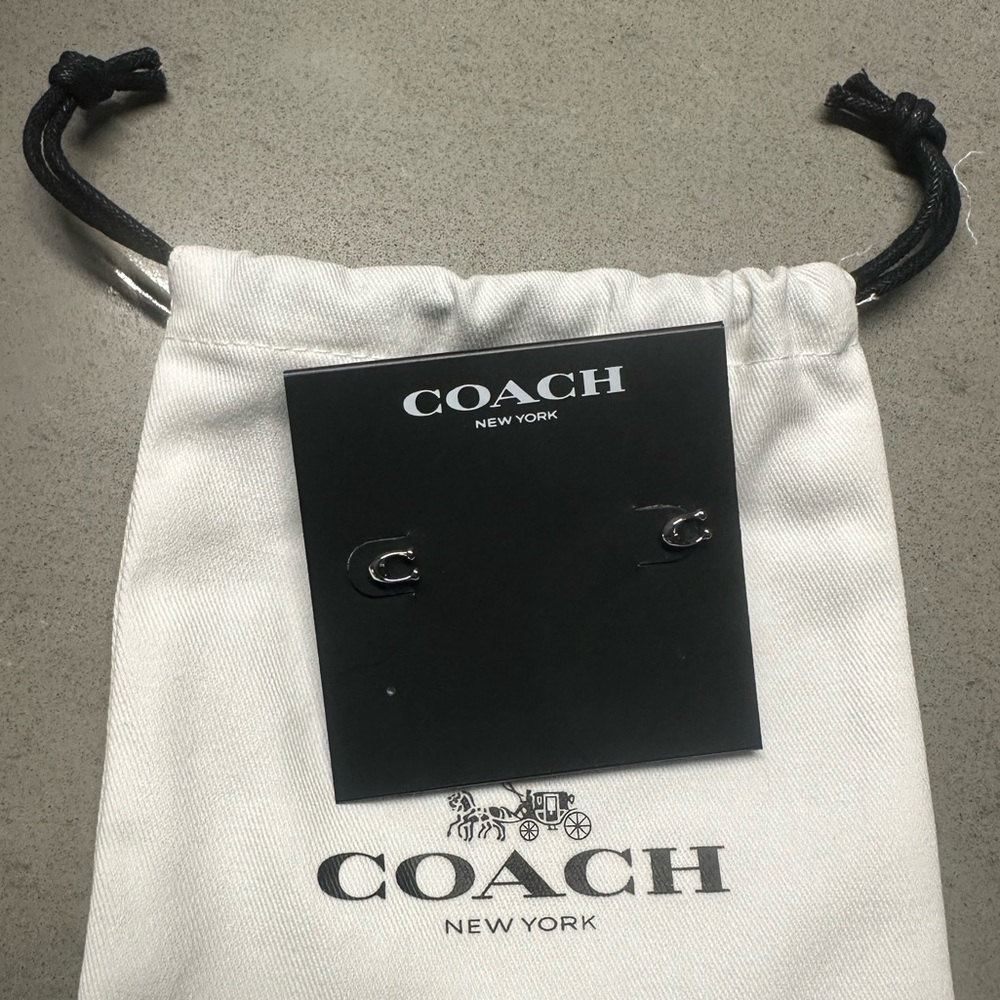 NEW coach earrings ! Silver c logo.